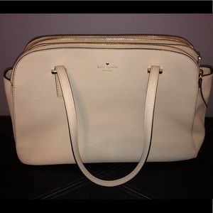 Taupe Kate Spade purse.